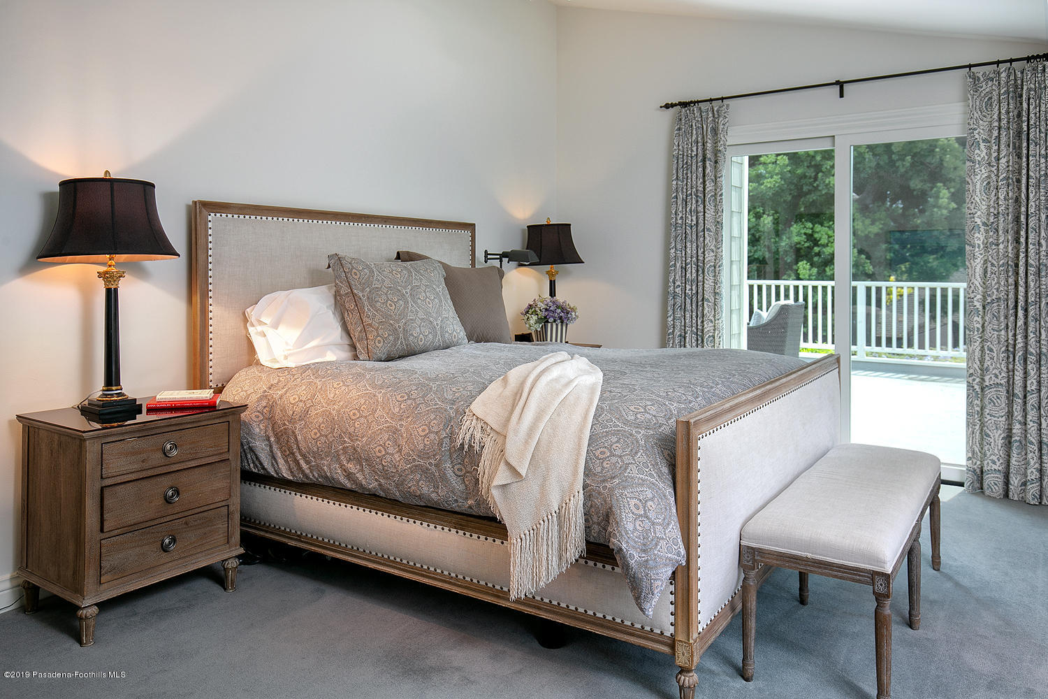 504 Arbor Street Pasadena, CA 91105 - Photo 22 of 46 a bedroom with a bed a lamp and a window