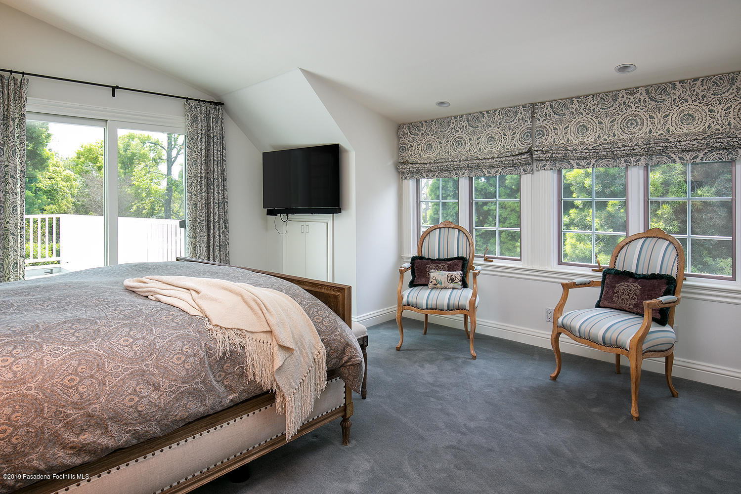 504 Arbor Street Pasadena, CA 91105 - Photo 23 of 46 a bedroom with a bed and a large window