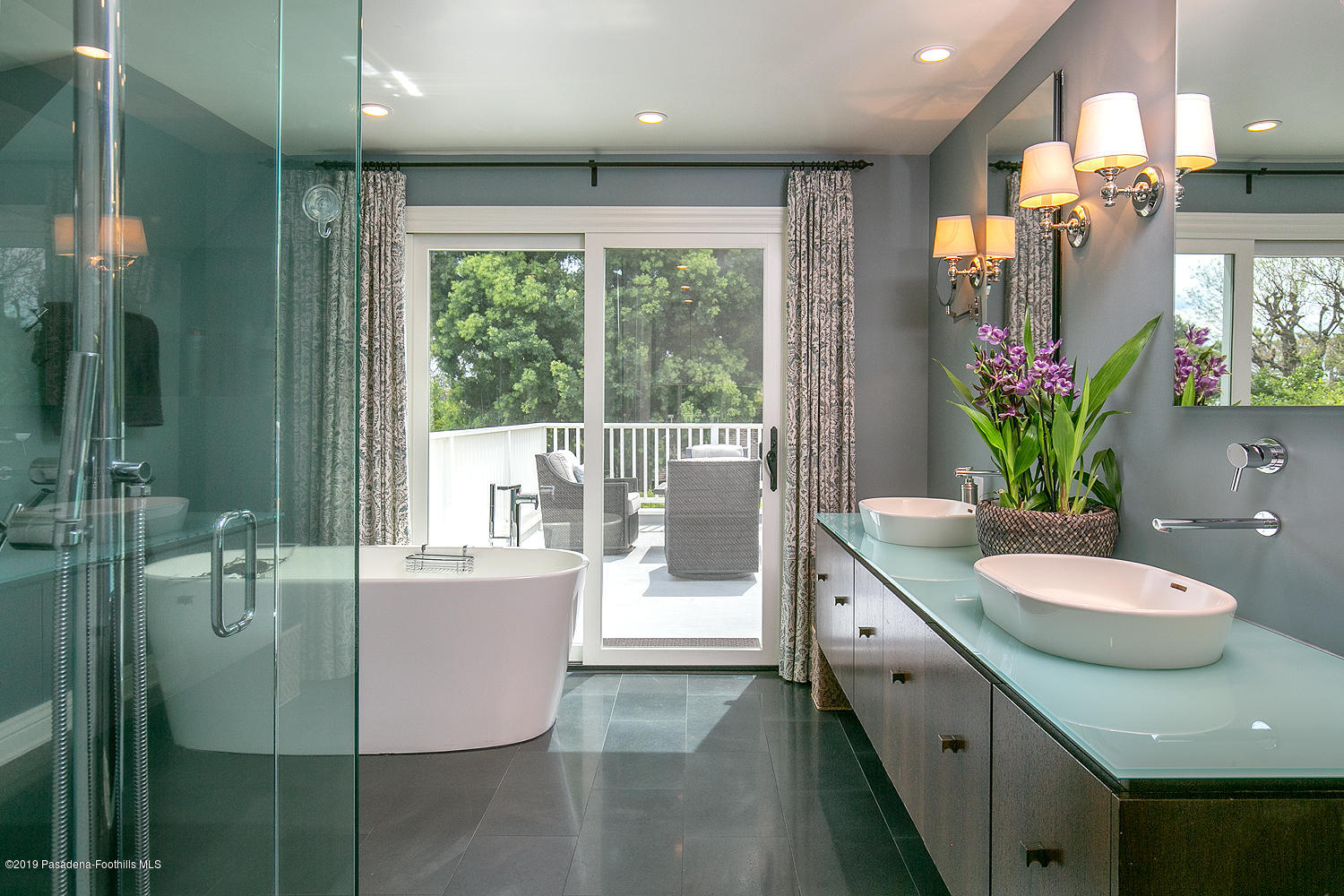 504 Arbor Street Pasadena, CA 91105 - Photo 27 of 46 a bathroom with a tub sink and mirror