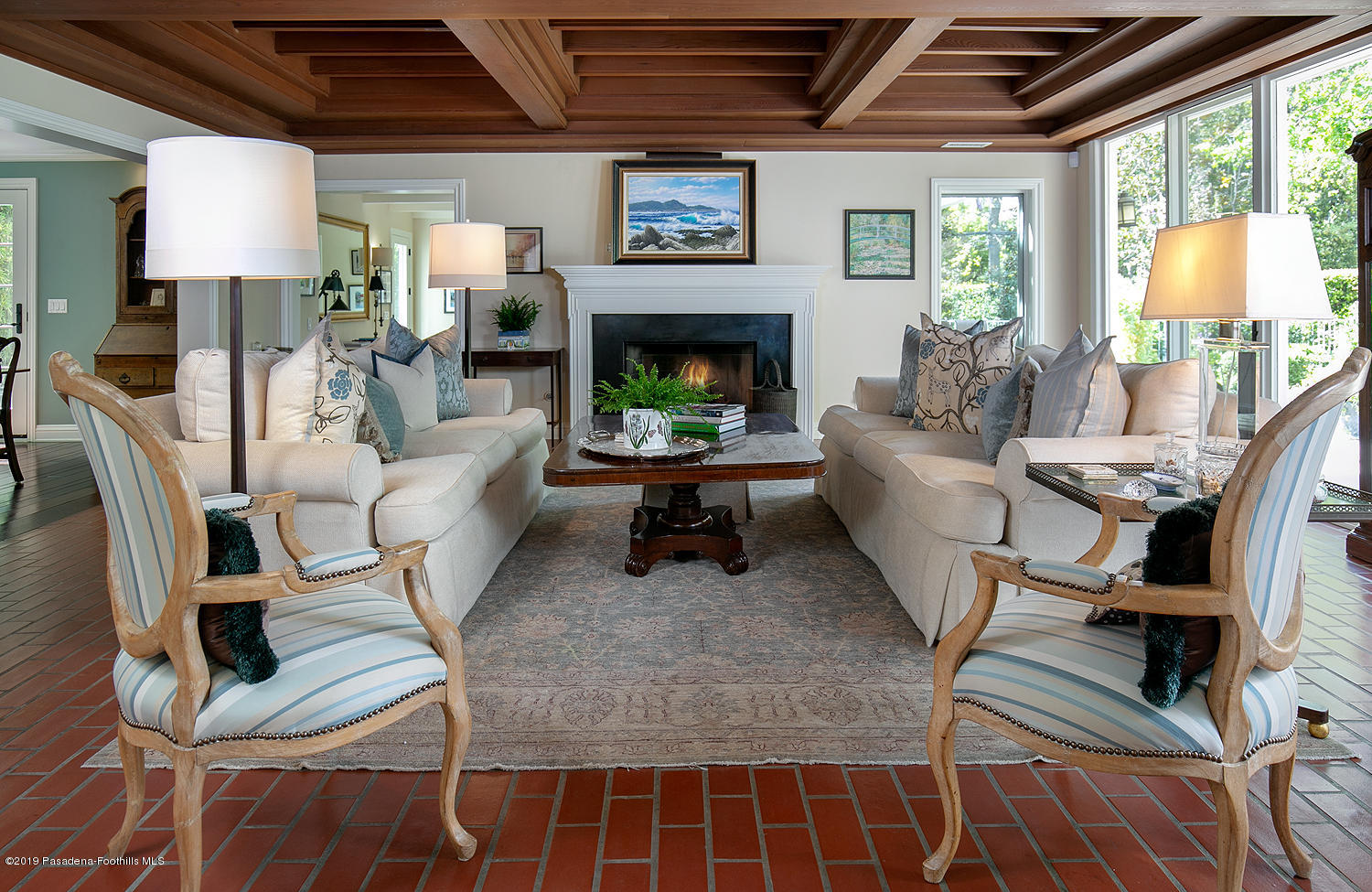 504 Arbor Street Pasadena, CA 91105 - Photo 4 of 46 a living room with furniture a fireplace and a flat screen tv