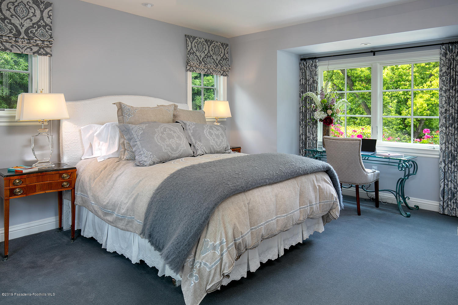 504 Arbor Street Pasadena, CA 91105 - Photo 31 of 46 a bed sitting in a bedroom next to a window