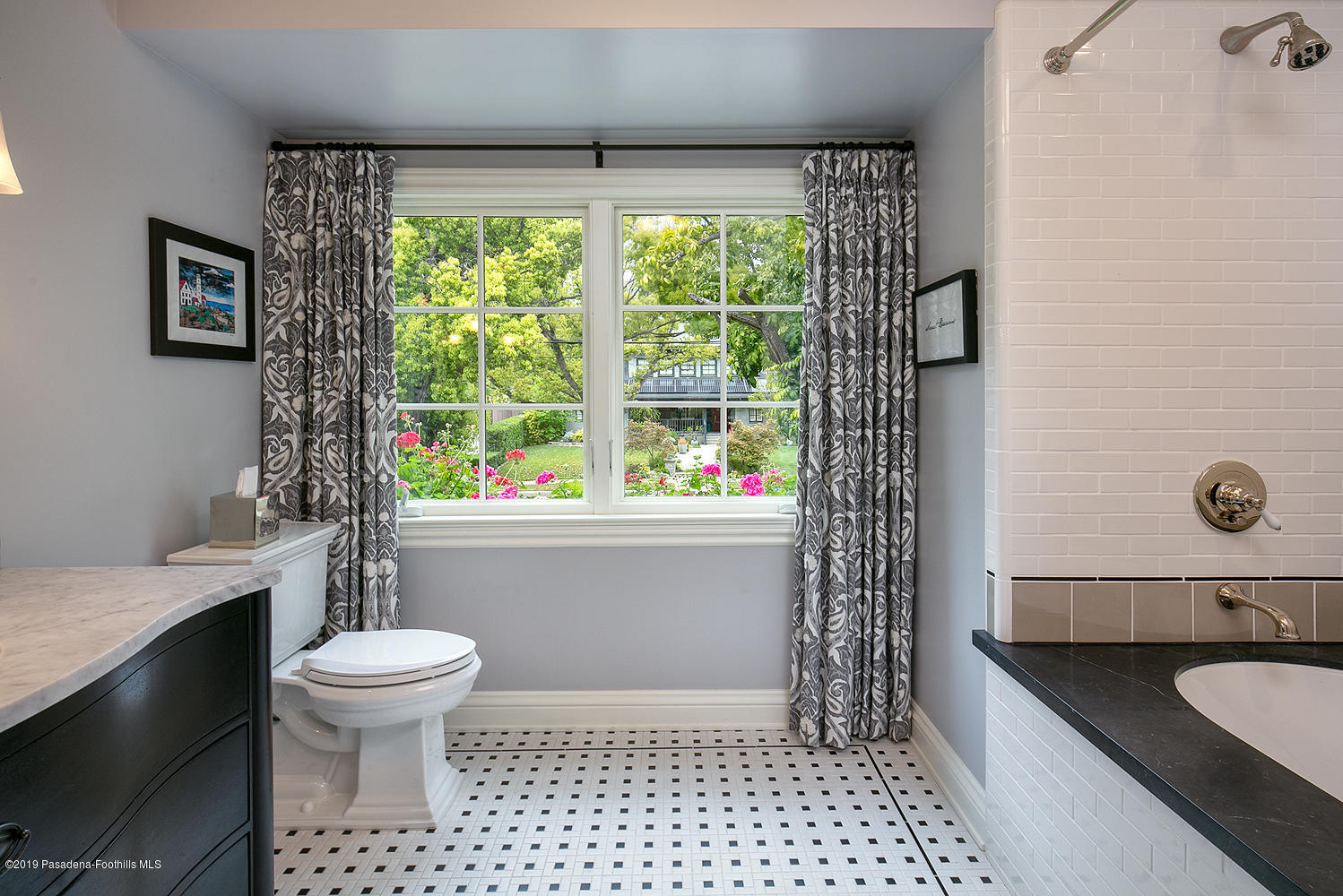 504 Arbor Street Pasadena, CA 91105 - Photo 32 of 46 a bathroom with a sink a toilet and a shower