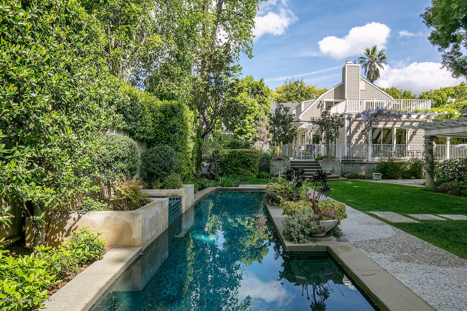 504 Arbor Street Pasadena, CA 91105 - Photo 38 of 46 a garden view with a seating space