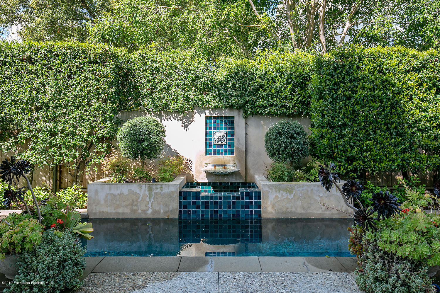 504 Arbor Street Pasadena, CA 91105 - Photo 39 of 46 front view of a house with a garden