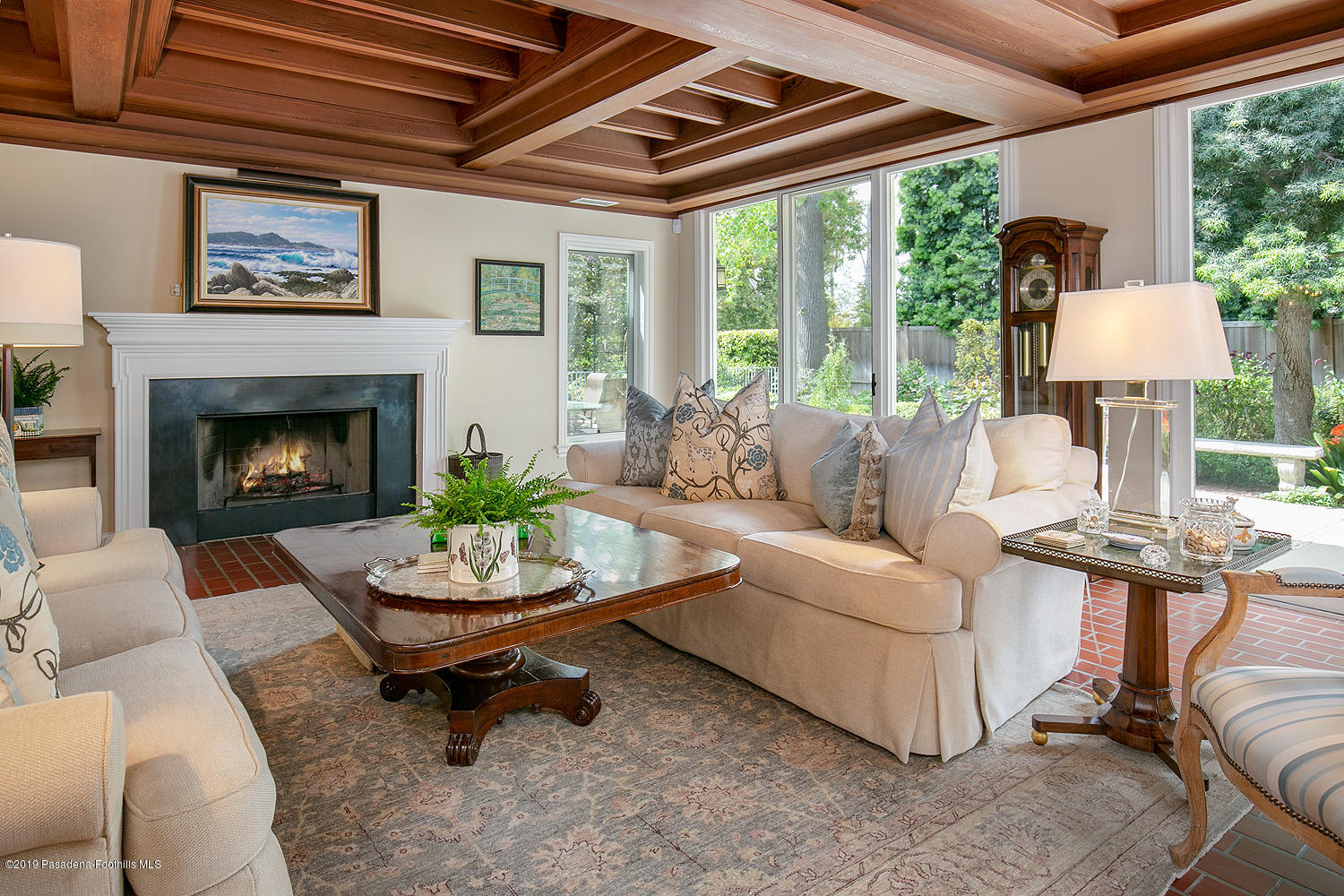 504 Arbor Street Pasadena, CA 91105 - Photo 5 of 46 a living room with furniture and a fireplace
