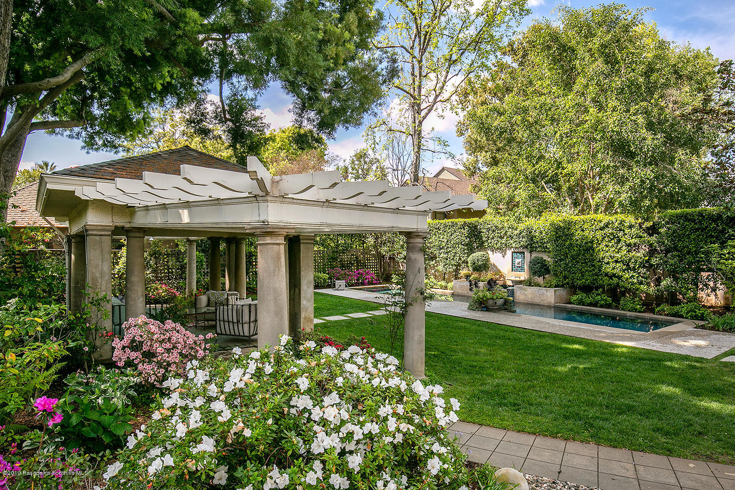 504 Arbor Street Pasadena, CA 91105 - Photo 43 of 46 a front view of a house with garden