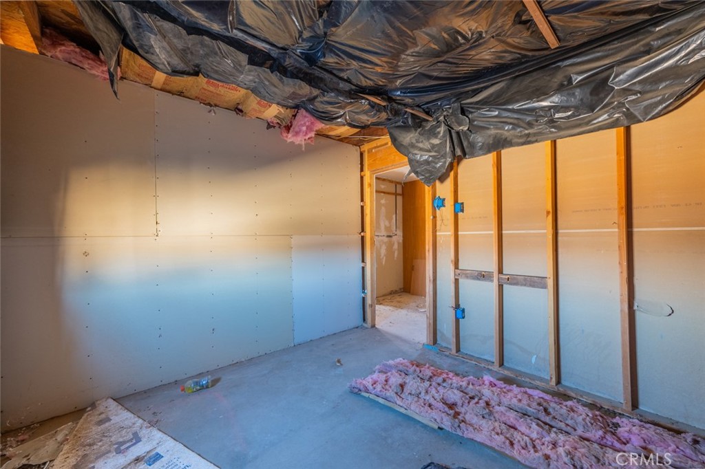 67722 Pole Line Road Twentynine Palms, CA 92277 - Photo 15 of 33 a view of storage and utility room