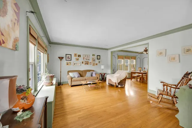 a living room with furniture and a table