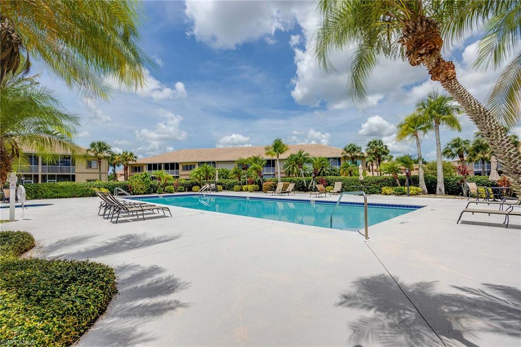 9022 Michael Circle, Unit 3 Naples, FL 34113 - Photo 27 of 29 a view of a park with palm trees