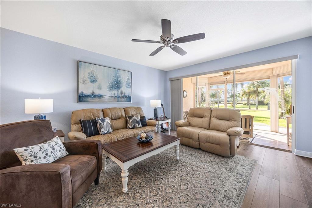 9022 Michael Circle, Unit 3 Naples, FL 34113 - Photo 7 of 29 a living room with furniture and a window