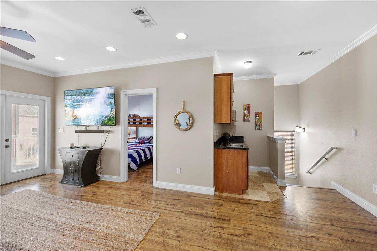 210 Grand Key Loop West Destin, FL 32541 - Photo 23 of 46 a view of a livingroom with furniture and a flat screen tv