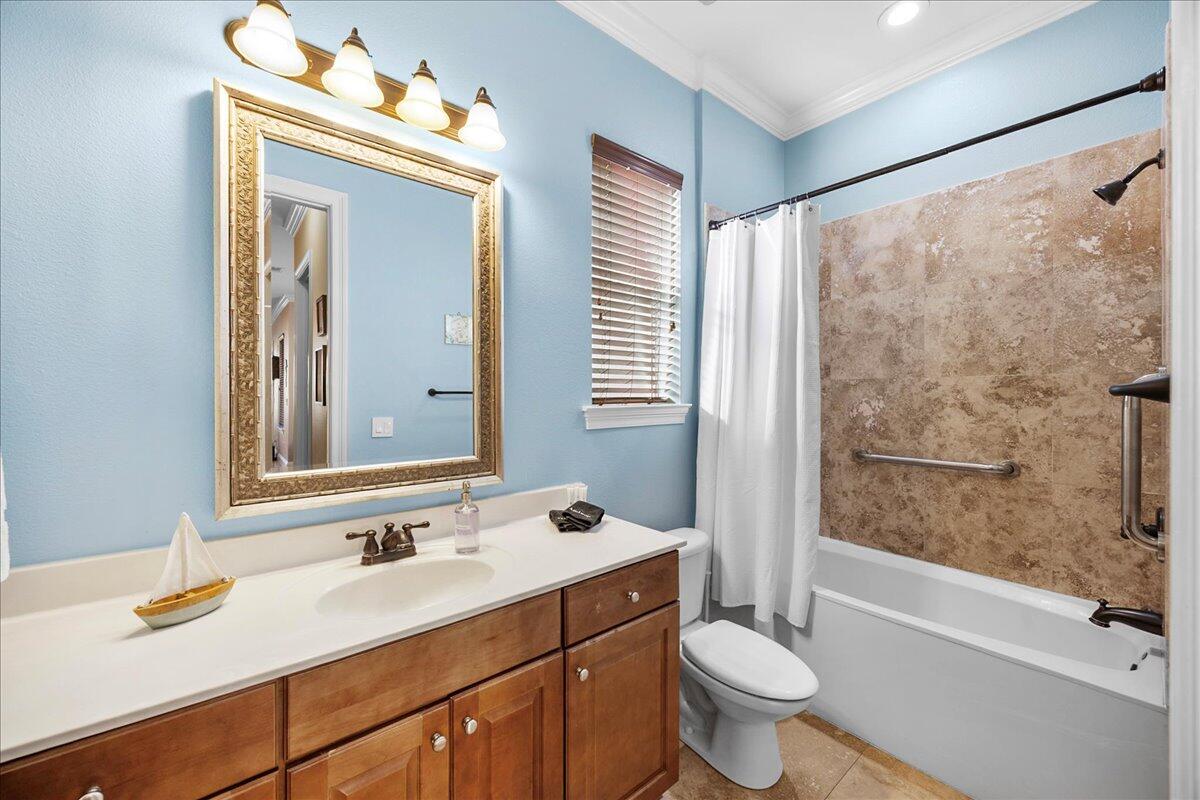 210 Grand Key Loop West Destin, FL 32541 - Photo 42 of 46 a bathroom with a granite countertop sink toilet and shower