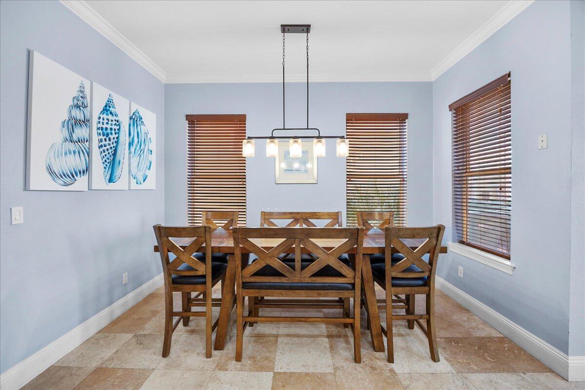 210 Grand Key Loop West Destin, FL 32541 - Photo 45 of 46 a dining room with furniture and window