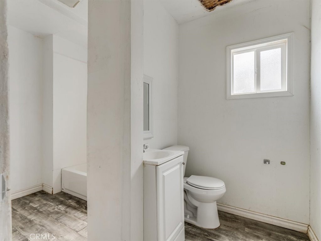 396 Pier Avenue Oceano, CA 93445 - Photo 19 of 24 a bathroom with a toilet