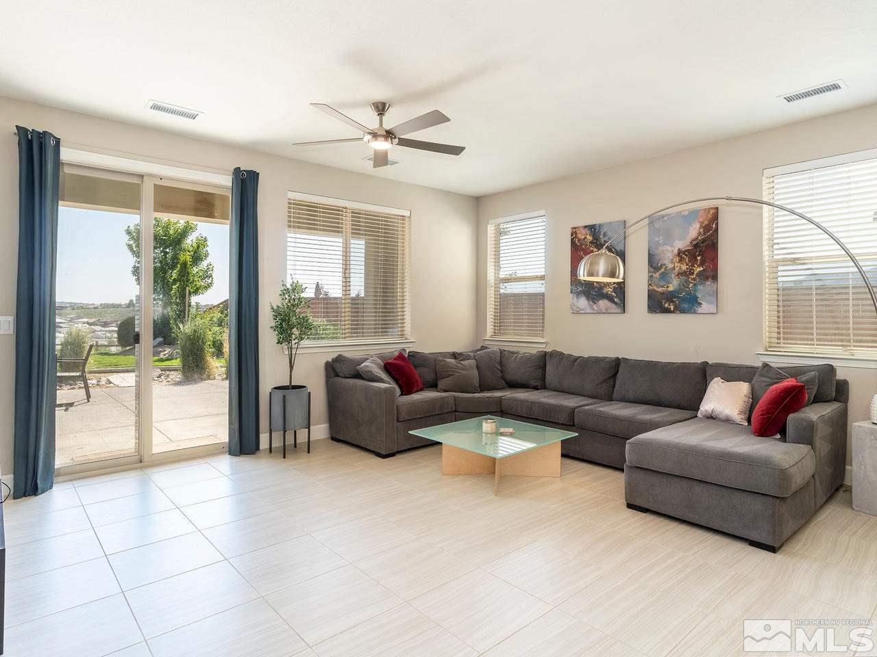 1650 Heavenly View Trail Reno, NV 89523 - Photo 7 of 25 a living room with furniture and a large window