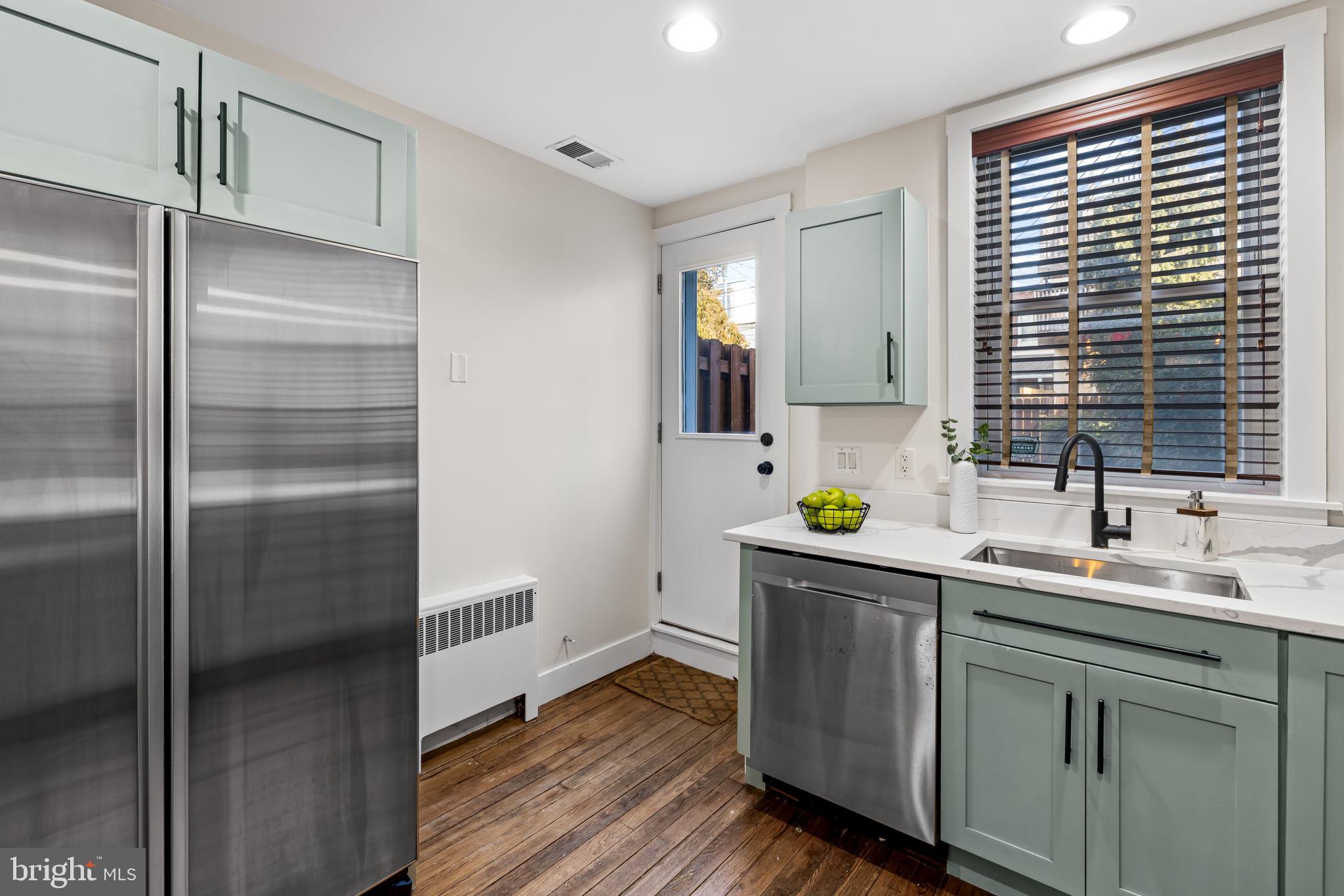 1459 Woodall Street Baltimore, MD 21230 - Photo 17 of 34 a kitchen with sink and window