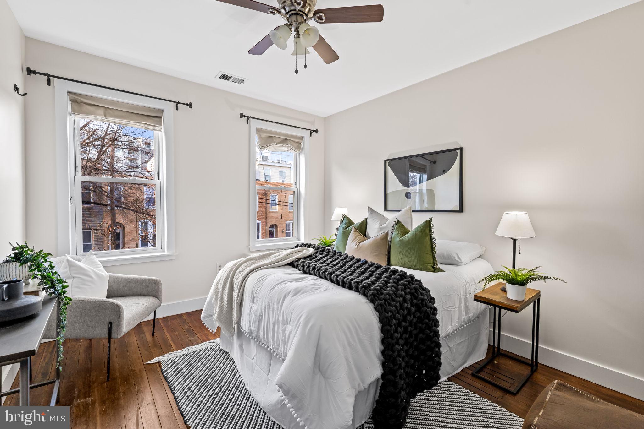 1459 Woodall Street Baltimore, MD 21230 - Photo 19 of 34 a bedroom with bed and a window