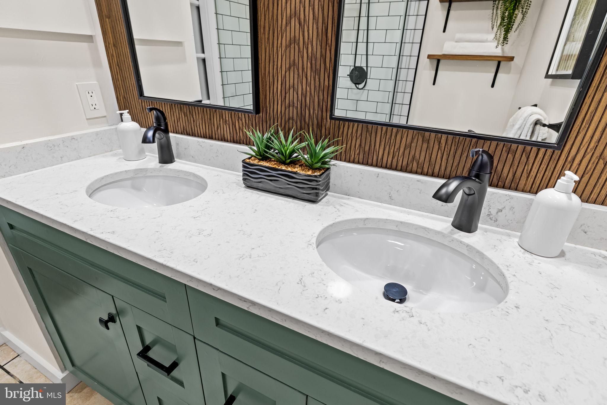 1459 Woodall Street Baltimore, MD 21230 - Photo 24 of 34 a bathroom with a sink and a mirror