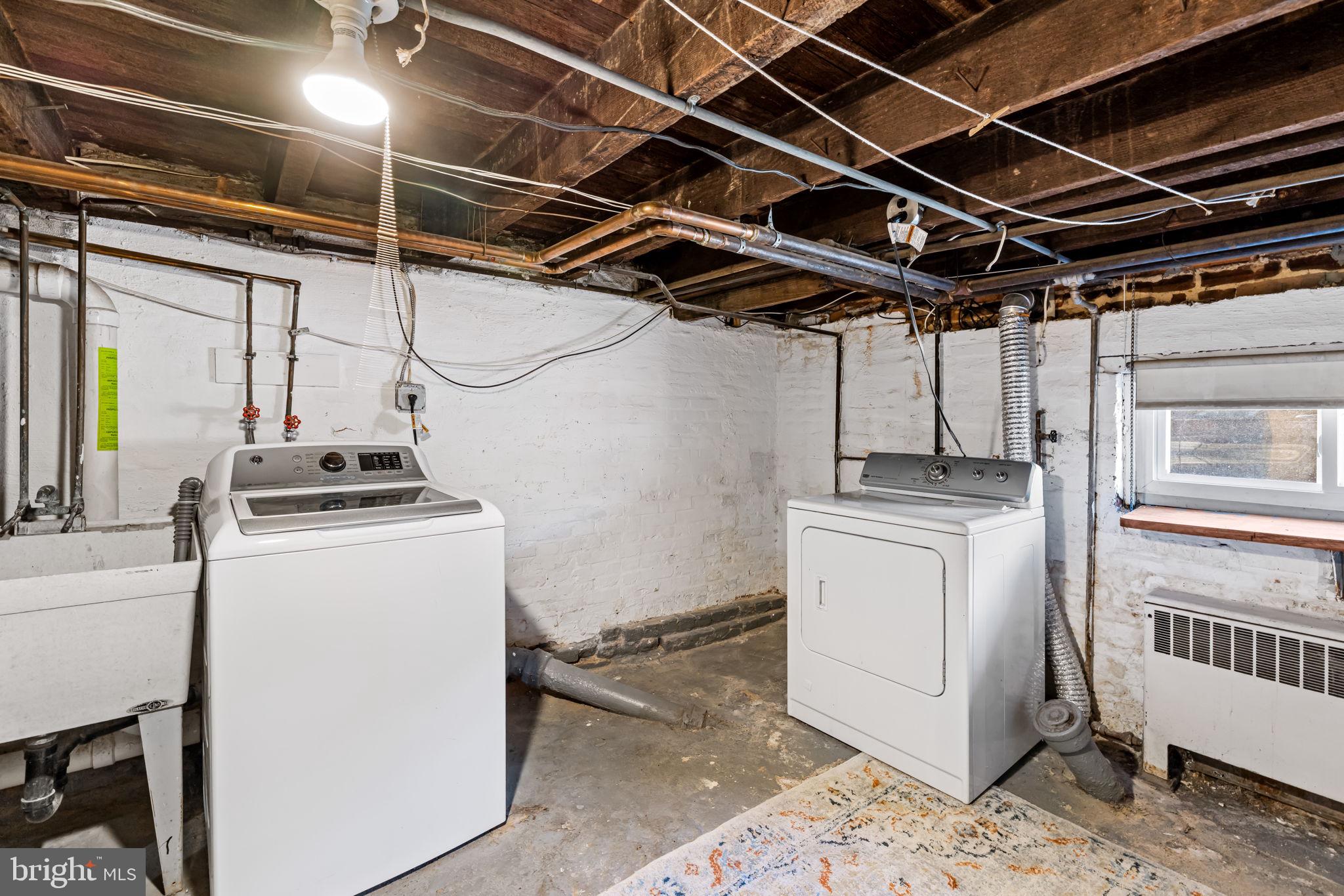 1459 Woodall Street Baltimore, MD 21230 - Photo 30 of 34 a utility room with dryer and washer