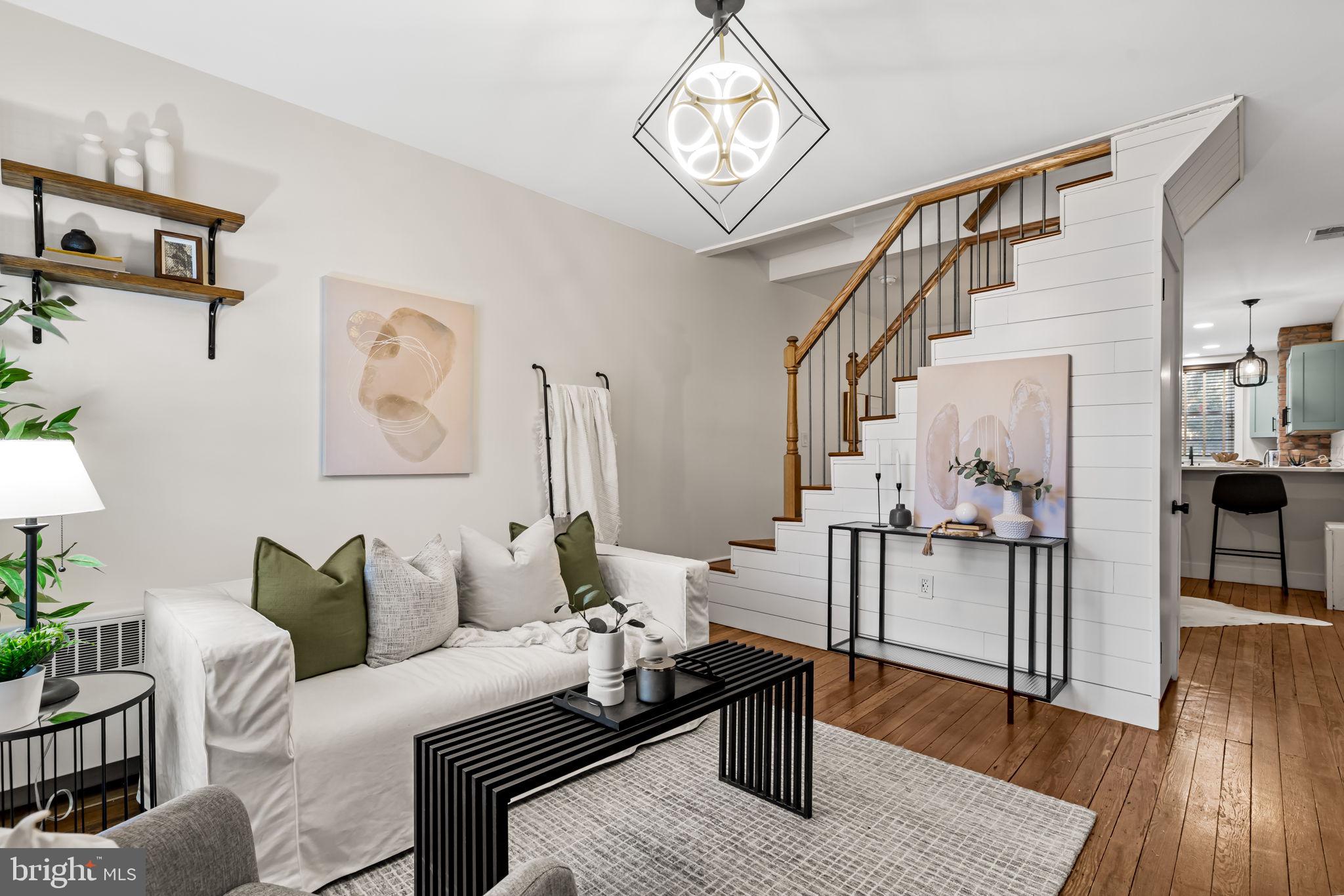 1459 Woodall Street Baltimore, MD 21230 - Photo 10 of 34 a living room with furniture and wooden floor