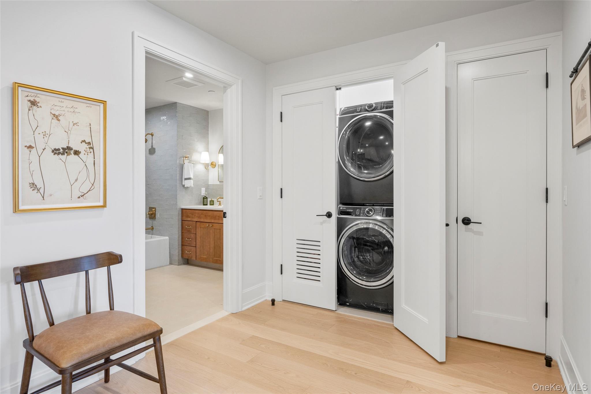 25 South Riverside Avenue, Unit 201 Croton-on-Hudson, NY 10520 - Photo 24 of 27 Convenient laundry with washer and dryer in hallway