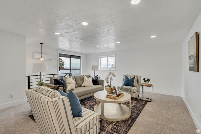 337 West 2900th Street South Bountiful, UT 84010 - Photo 23 of 35 Living area featuring light colored carpet and recessed lighting