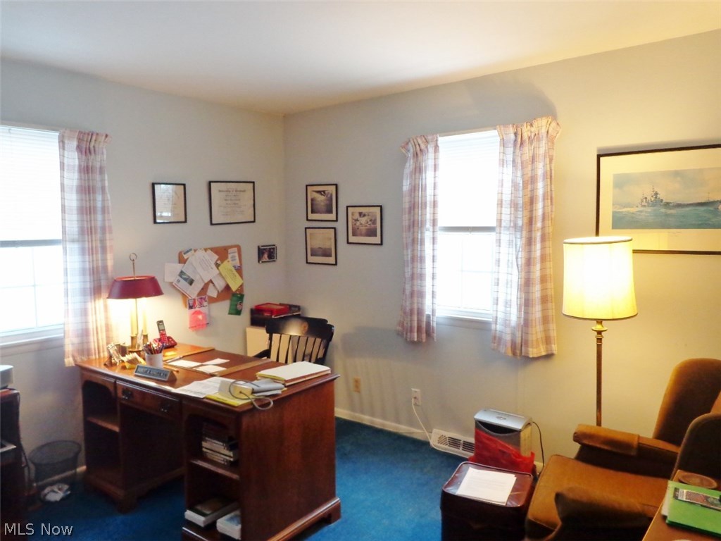 7703 Diagonal Road Kent, OH 44240 - Photo 12 of 19 Upstairs you will find 4 bedrooms and 2 full baths. Here we see a smaller bedroom converted into an office.