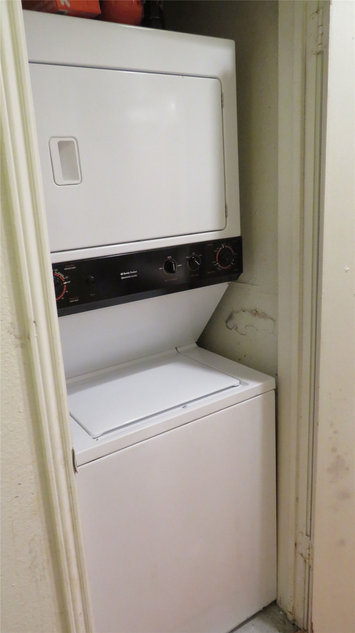 1910 Robbins Place, Unit 202 Austin, TX 78705 - Photo 12 of 15 Washroom with estacked washer and dryer
