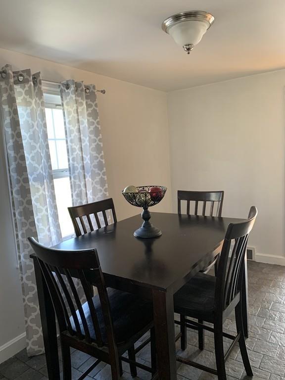 17 Daley Street Leominster, MA 01453 - Photo 11 of 21 a view of a dining room with furniture and window