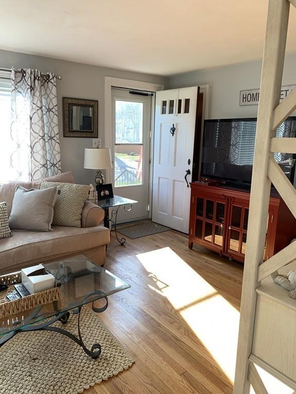 17 Daley Street Leominster, MA 01453 - Photo 13 of 21 a living room with furniture and a flat screen tv