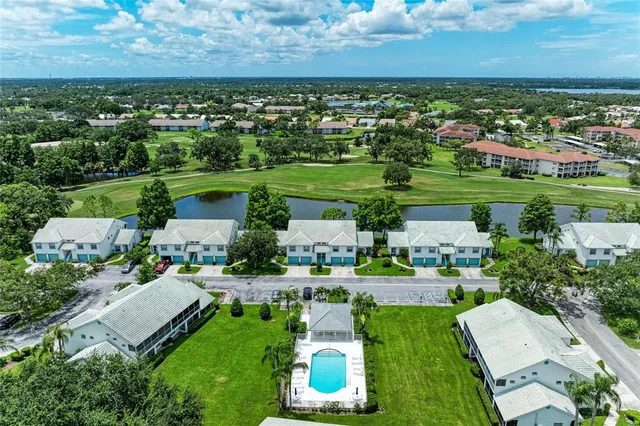 an aerial view of a house with a garden and outdoor space