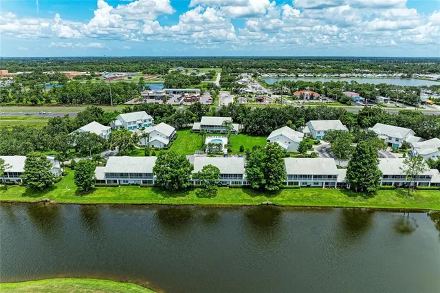 a view of a lake with a city