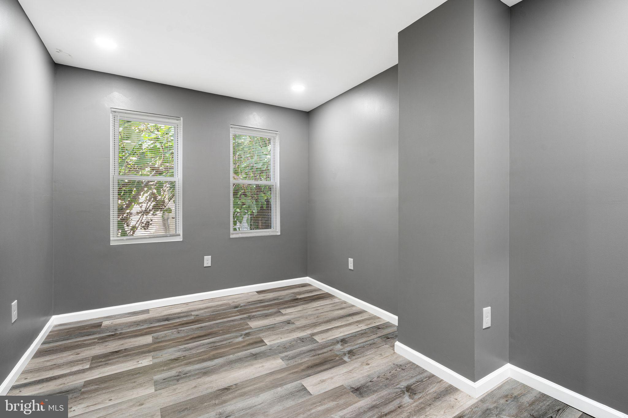 2550 North 12th Street Philadelphia, PA 19133 - Photo 8 of 8 a bedroom with a bed and a window