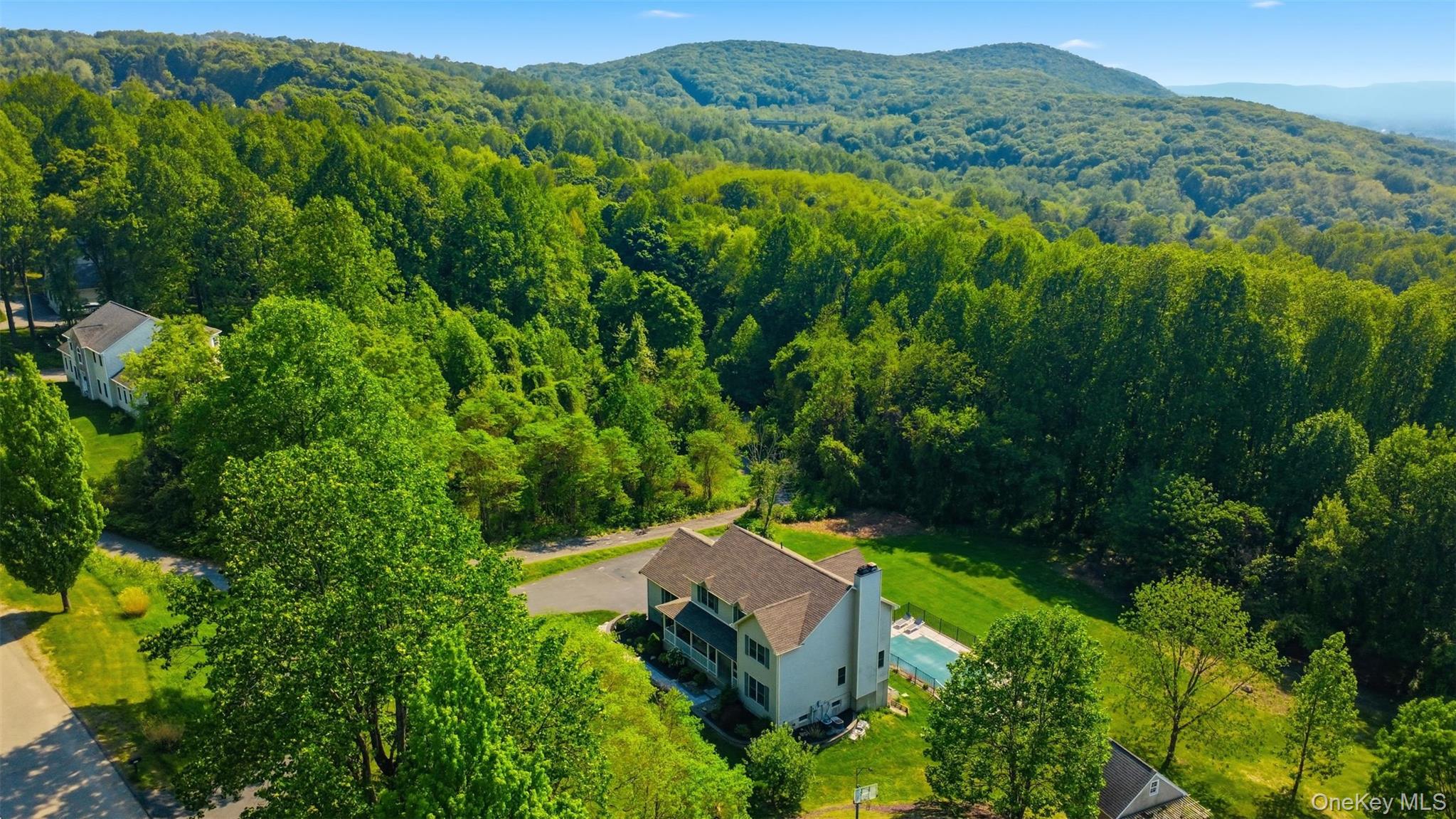 233 Devon Farms Road Stormville, NY 12582 - Photo 47 of 48 an aerial view of a house with a yard