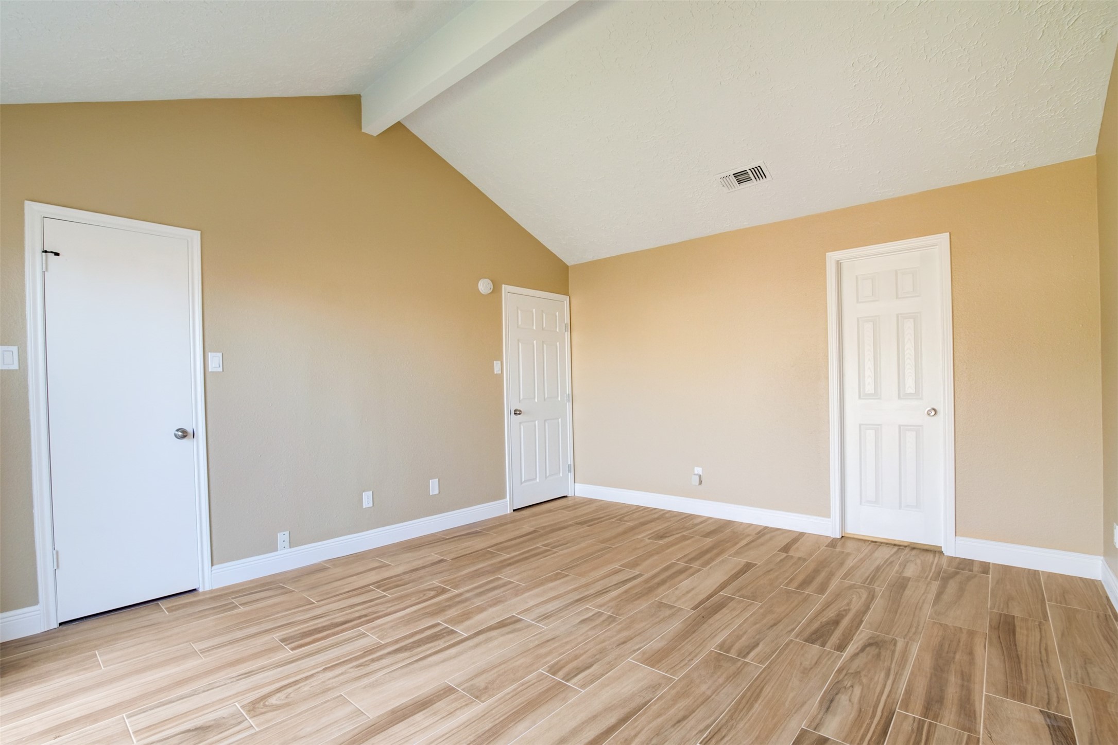 11840 Spring Grove Drive Houston, TX 77099 - Photo 16 of 27 Expansive primary suite with vaulted ceilings — your private retreat