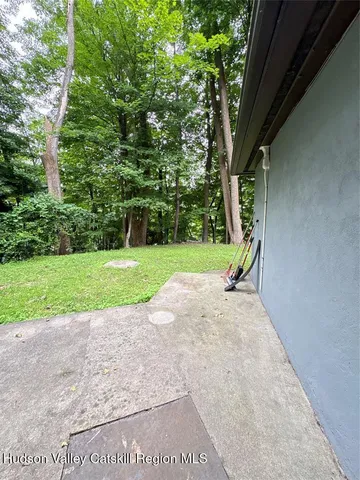 a view of outdoor space with deck and yard