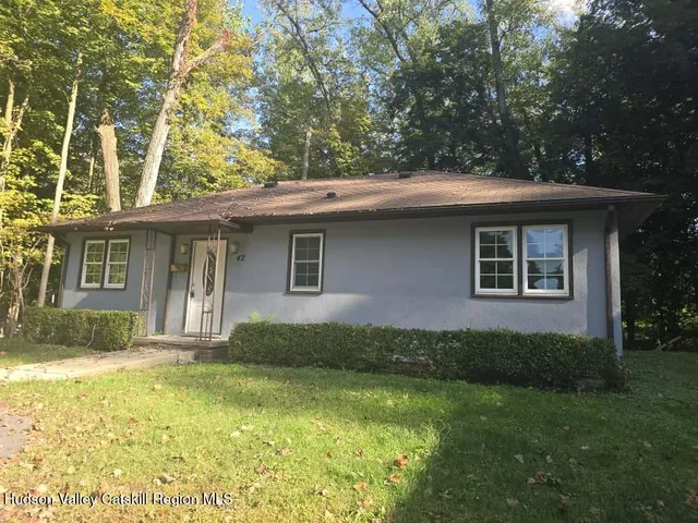 a view of street with parked cars