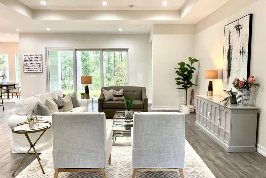 1955 Northwest 79th Loop Ocala, FL 34475 - Photo 4 of 8 a living room with furniture and a large window