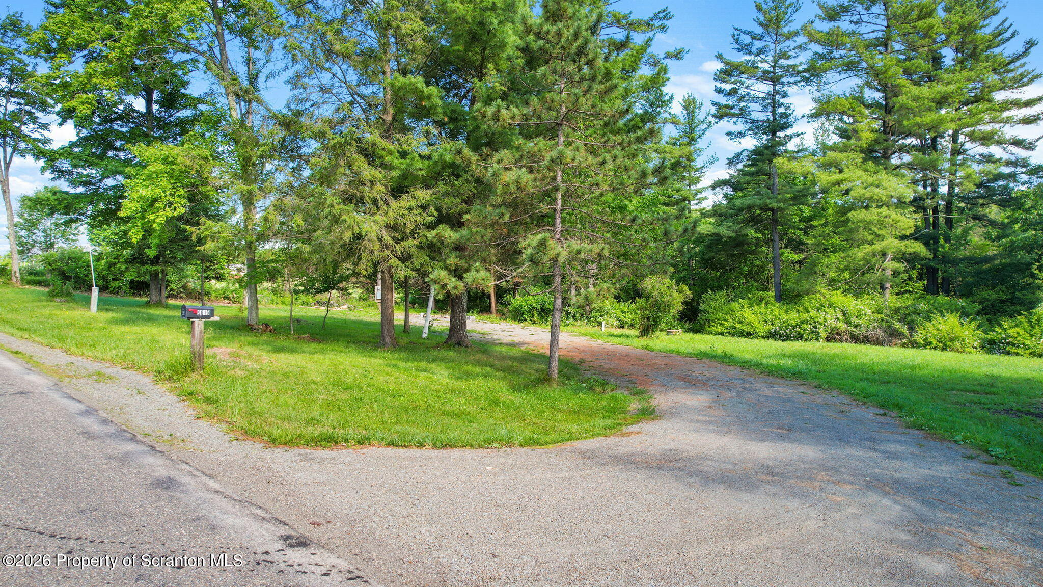9015 Laurel Lake Road Montrose, PA 18801 - Photo 12 of 25 a view of a garden with trees