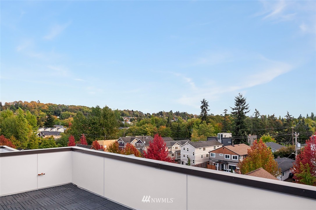2829 Southwest Adams Street Seattle, WA 98126 - Photo 16 of 17 a view of a city from a balcony