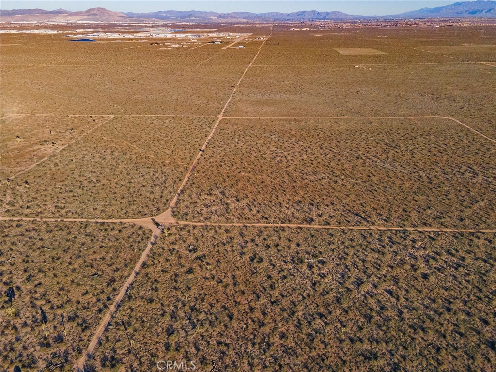 123 Tumbleweed Road Adelanto, CA 92301 - Photo 22 of 23 a view of an ocean and beach