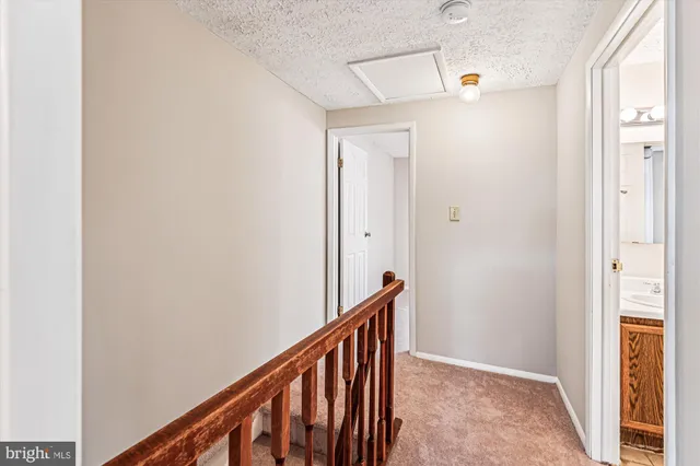 a view of hallway with stairs