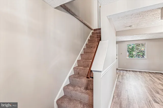 a view of entryway with stairs