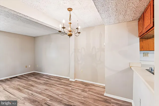 a view of a livingroom with a dishwasher and a microwave oven