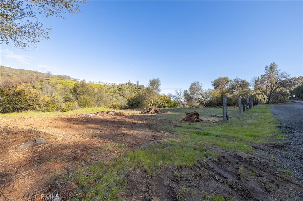 a view of mountain view with trees