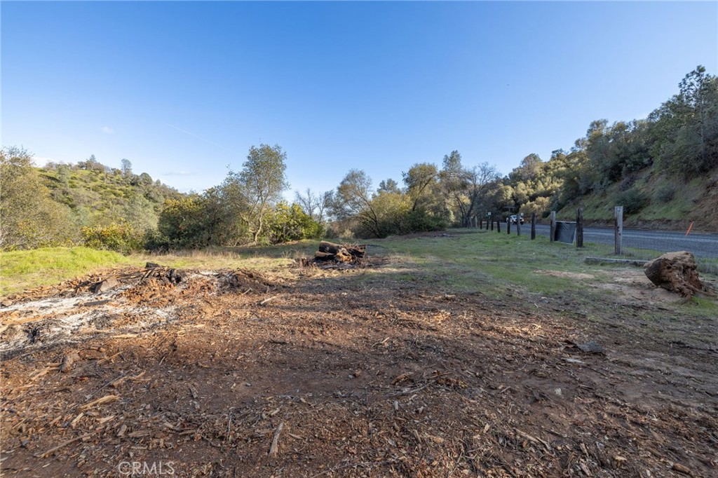 0 Highway 140 Mariposa, CA 95338 - Photo 3 of 51 a view of dirt field with large trees