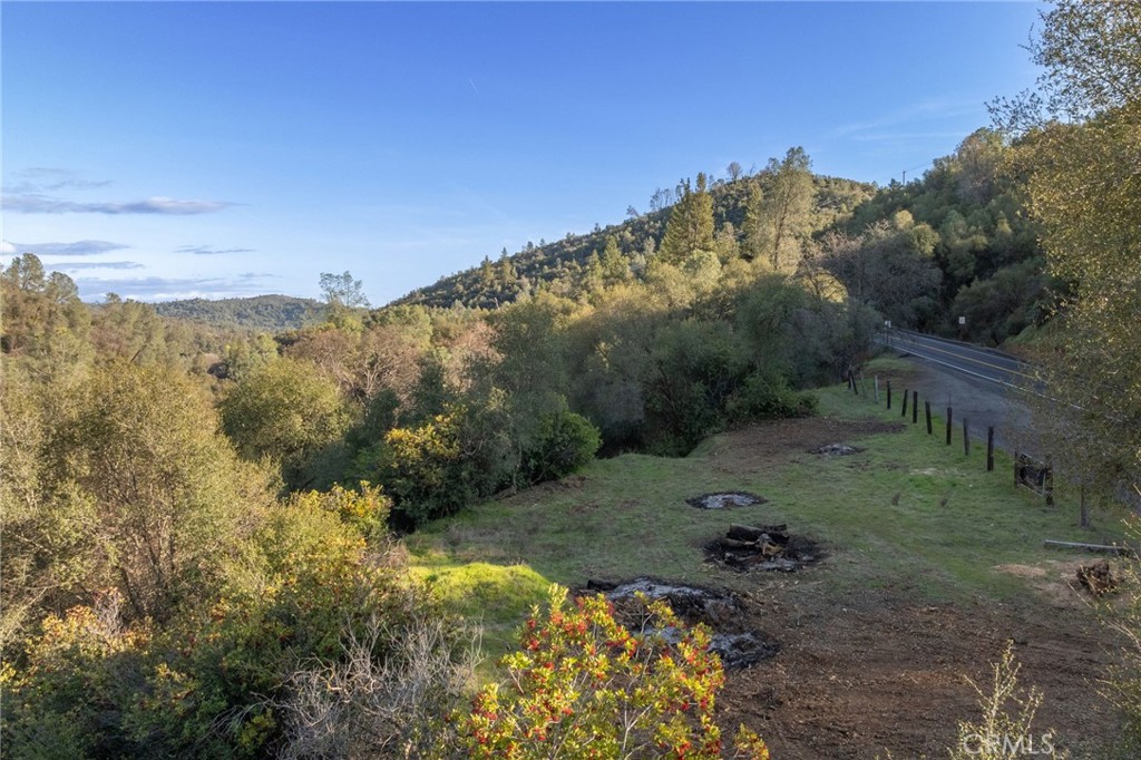 0 Highway 140 Mariposa, CA 95338 - Photo 41 of 51 a view of a forest with mountains in the background