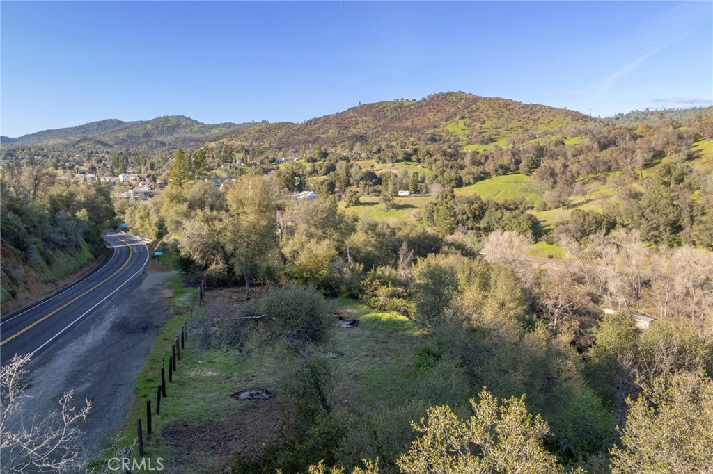 0 Highway 140 Mariposa, CA 95338 - Photo 42 of 51 a view of a city with mountains in the background