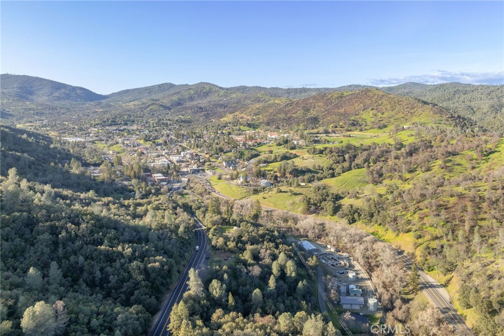 0 Highway 140 Mariposa, CA 95338 - Photo 47 of 51 a view of a mountain range in a cloudy sky