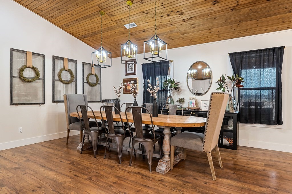 240 Bob Ledbetter Road Livingston, TN 38570 - Photo 11 of 62 a view of a dining room with furniture and wooden floor